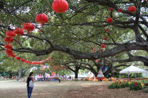 Sita under some lanterns